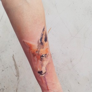 artista russa cria tatuagens impressionantes com aquarela