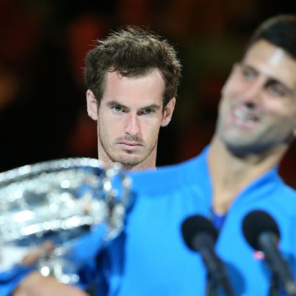 MELBOURNE, AUSTRALIA - FEBRUARY 01:  Andy Murray of Great Britain looks on as Novak Djokovic of Serbia holds the Norman Brookes Challenge Cup after he won their men's final match during day 14 of the 2015 Australian Open at Melbourne Park on February 1, 2015 in Melbourne, Australia.  (Photo by Scott Barbour/Getty Images)